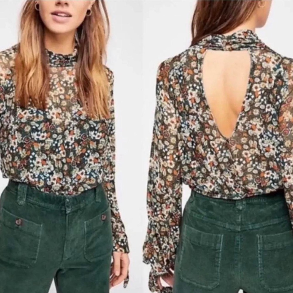 Free People multicoloured floral blouse with tie back detail.